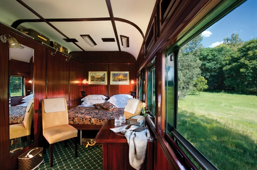 A wood-panelled train suite